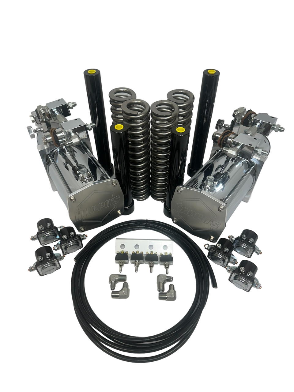Hoppos Hydraulic Suspension Kit (FBSSMINI) Front/Back/Side/Side 2- Chrome Pumps 2- Chrome Motors 2- Pairs Of Cylinders (1 pair 6 FRONT & 1 pair 8 REAR) 2- Pairs Mini Coils 4- Dumps (Product will vary depending on stock) 4- Solenoids 17' Ft of Switch Cord 4- 6 Prong Switches w/ Panel 1- Complete Fitting Kit w/ Slo-Downs 1- Complete #6 JIC Hose Kit SOME PARTS MAY VERY DEPENDING ON STOCK KITS DO NOT COME ASSEMBLED BATTERIES AND CABLE ARE NOT INCLUDED
